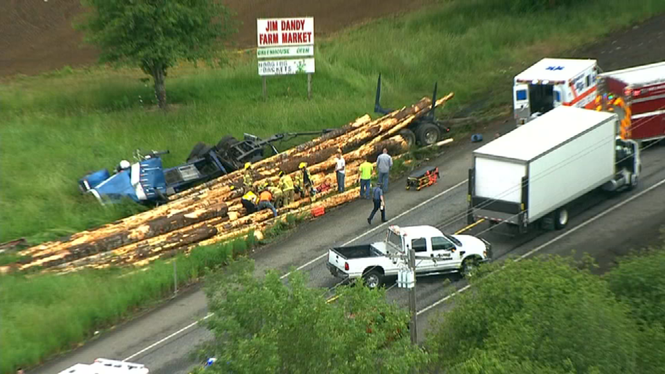Highway 26 reopens following fatal crash involving log truck, pi