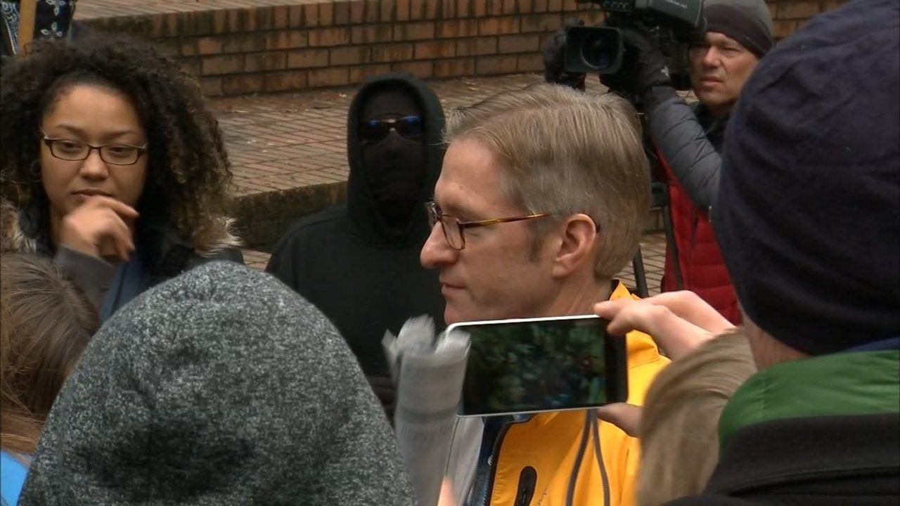 Portland Mayor Ted Wheeler took questions from protesters outside City Hall on Wednesday. (KPTV)
