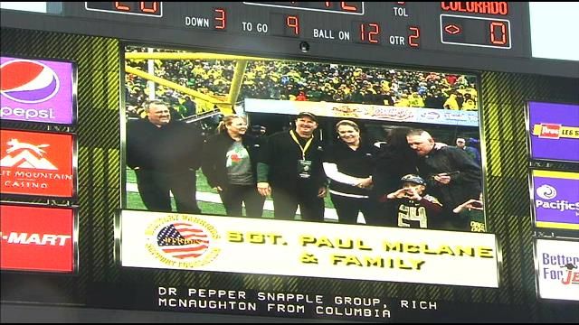... honored at the Oregon Ducks game Saturday with a mortgage-free home